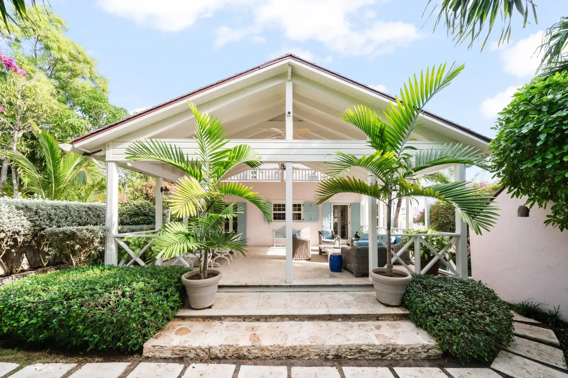Completed residential build in Nicaragua by Nicaragua Construction, covered terrace and tropical garden