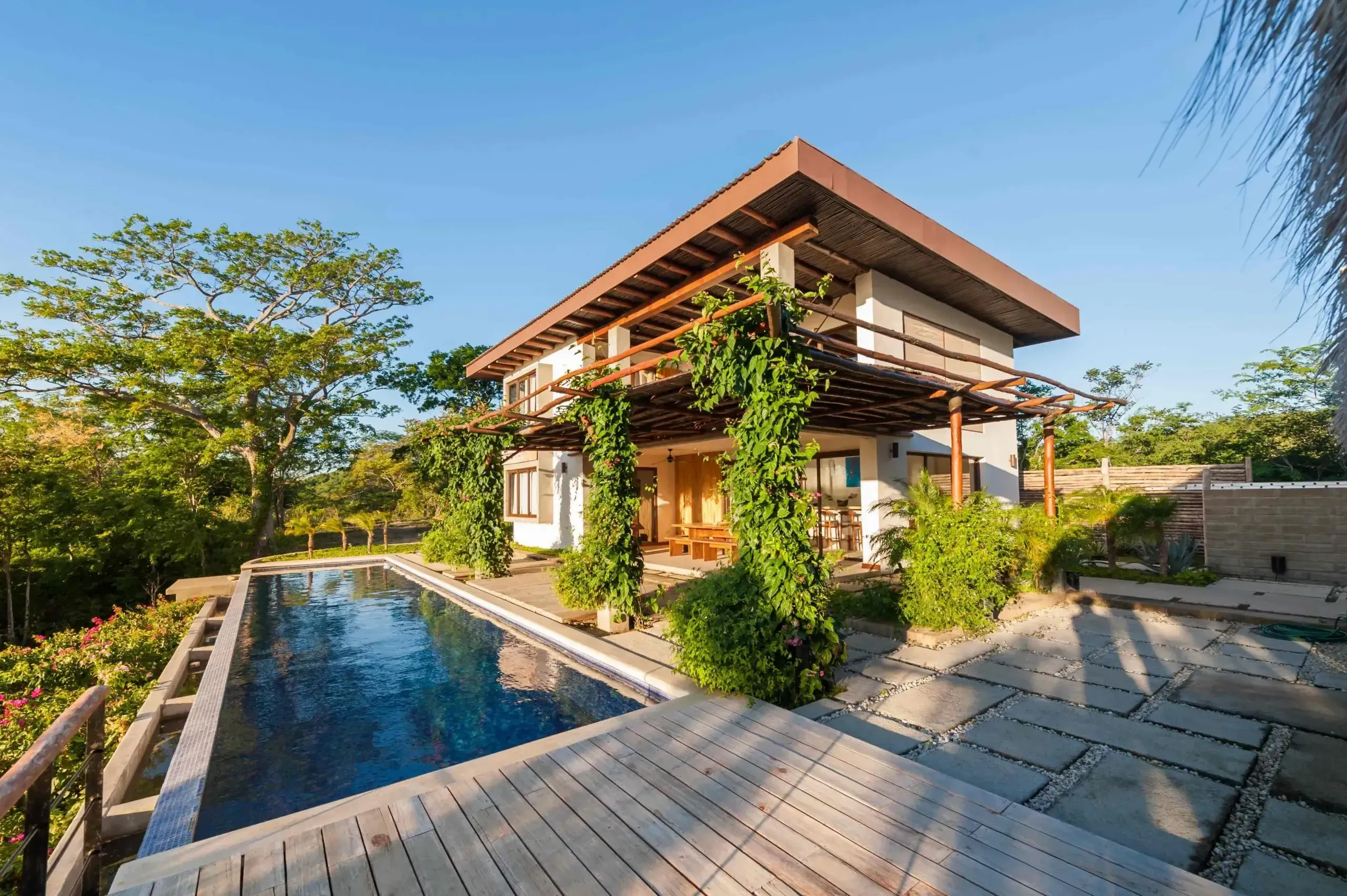 Custom home builder Nicaragua — aerial view of a finished residential build on the Pacific coast
