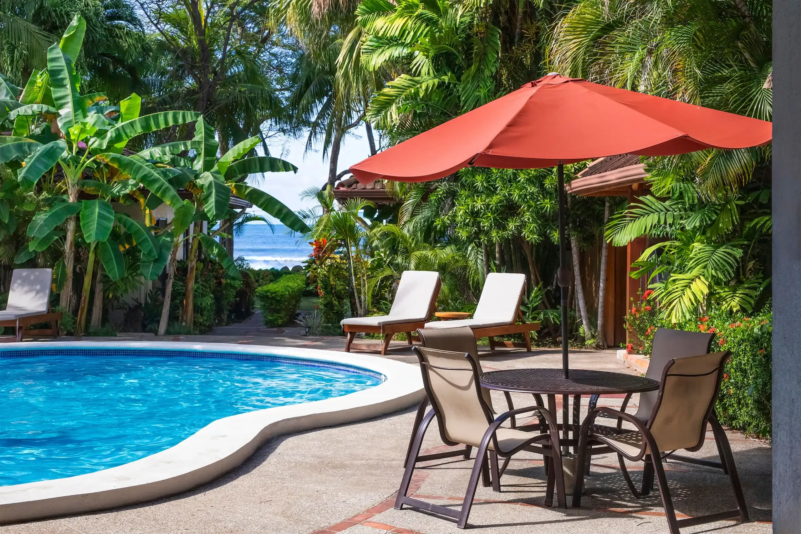 Completed guesthouse terrace in Nicaragua at golden hour, tropical landscape and investment property setting